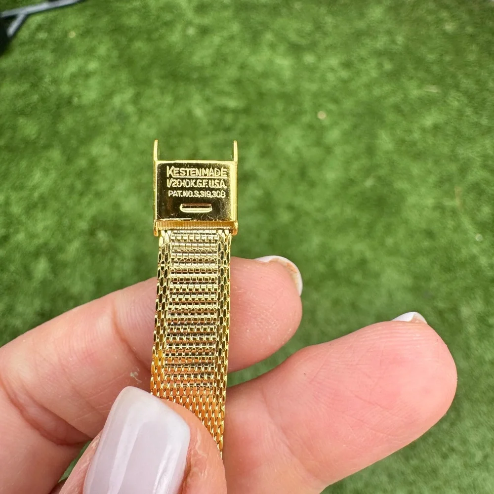 Bulova Women's Gold-Tone Mesh Bracelet Watch with Black Dial